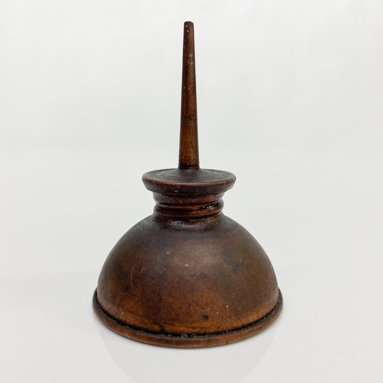 antique oil can
