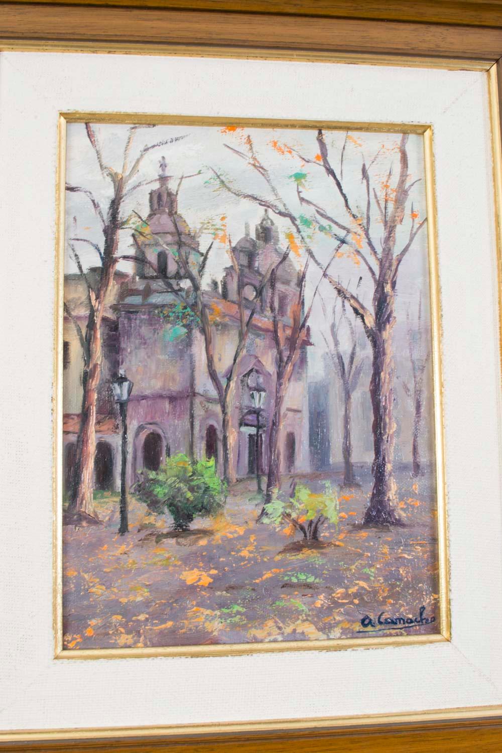 This is a vintage oil on canvas landscape with a church in the background signed in the bottom right corner 'A. Camacho' and dating from the first half of the 20th century.

The painting depicts a church behind autumnal trees.

The grey palette