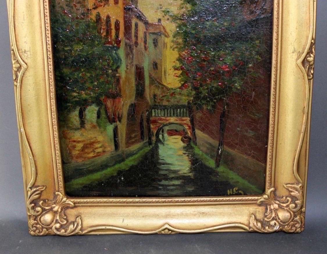 italien Peinture à l'huile sur toile d'une scène de canal de Venise avec cadre en bois doré en vente