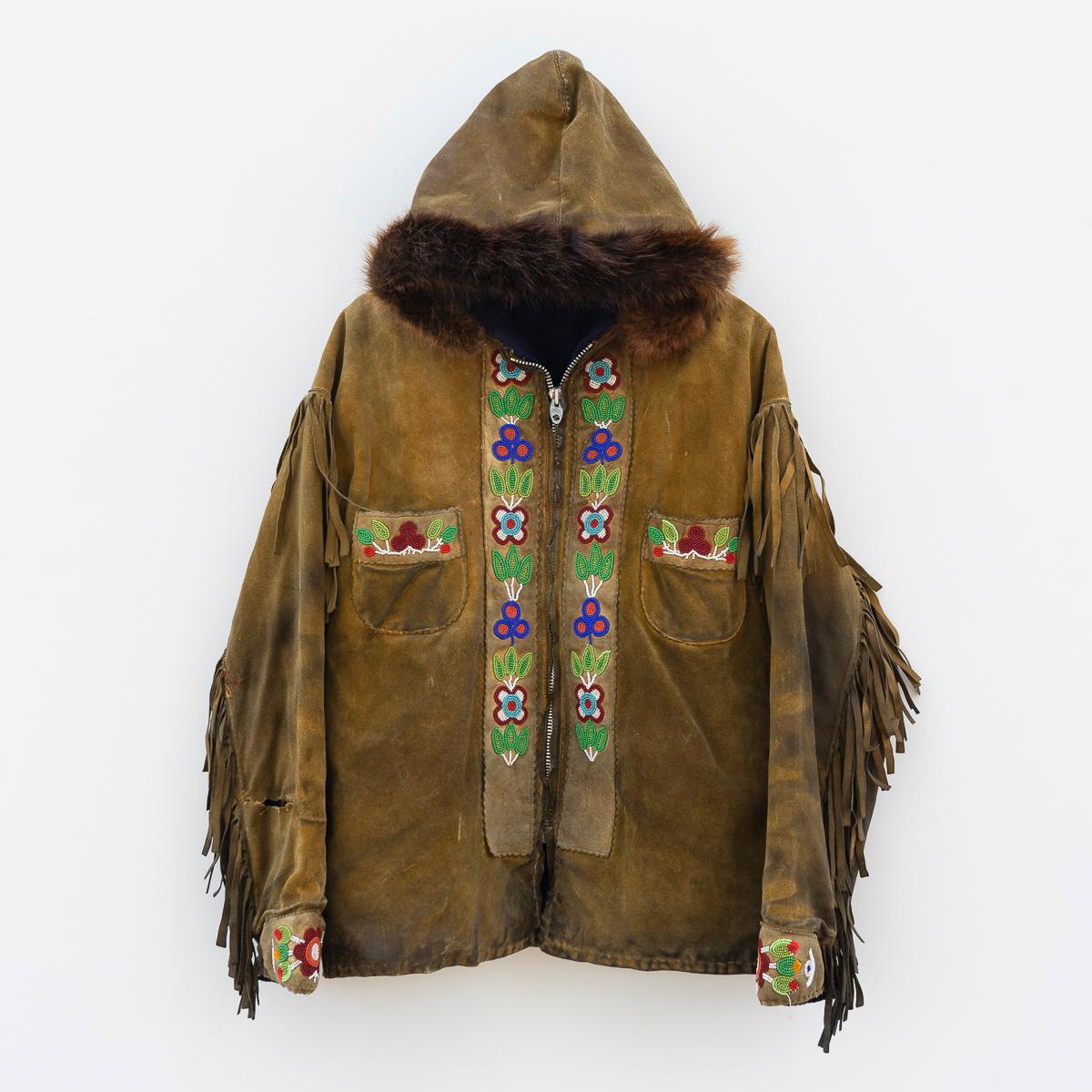 TRADITIONAL OJIBWAY TRIBAL COAT WITH FLORAL BEAD DETAILING
Originating from the Ojibwe (Ojibwa) people from what is currently Southern Canada and the North Mid-Western United States.

Handmade from smoked moose leather with tassel