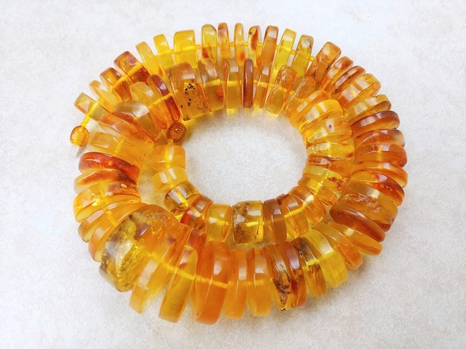 The length of the necklace is 21 inches (53cm). Live chopped pieces disks of raw Baltic amber. The size varies from 15 to 32mm.
The color of amber is transparent, honey.
The color is authentic and natural.
100% Natural Baltic Healing amber.