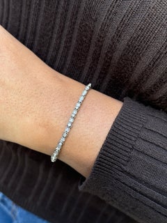 Bracciale da tennis graduato in platino e diamanti taglio antico d'epoca, circa 1930