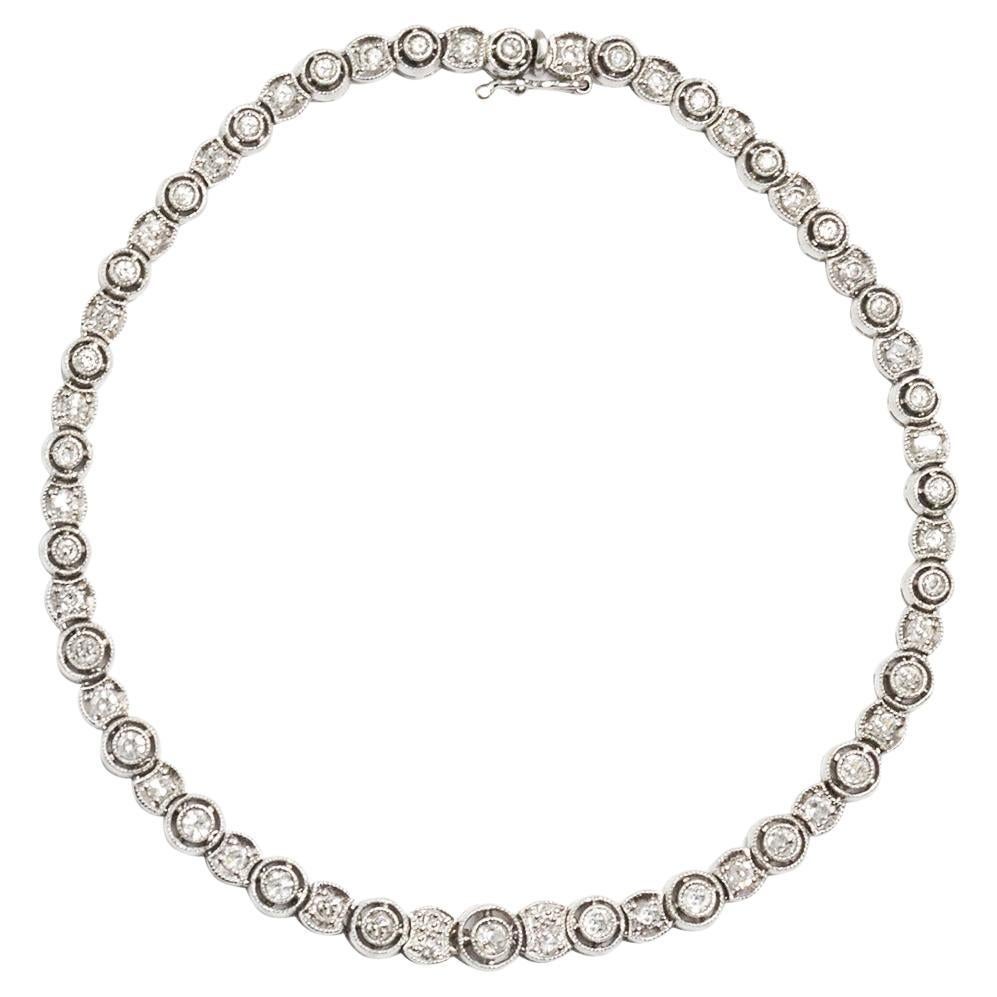 Bracciale da tennis graduato in platino e diamanti taglio antico d'epoca, circa 1930