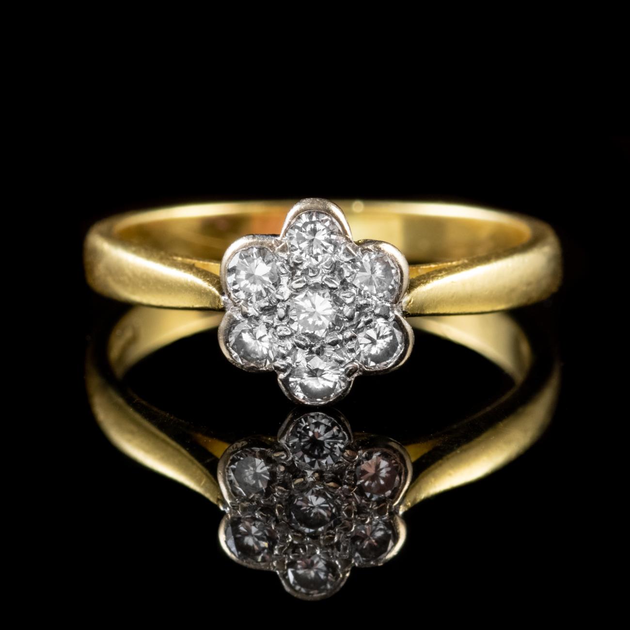 This beautiful ring has been commissioned in 18ct Yellow Gold and features an ornate 18ct White Gold gallery. The gallery is set with seven sparkling old cut Diamonds, each of which weighs approx. 0.08ct and boasts a clarity of VS1 and H