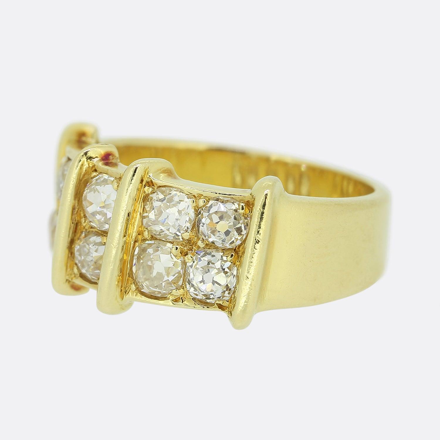 Here we have an excellently crafted 14ct yellow gold diamond ring. The face of this piece has been split into three defined sections across two rows with a duo of old cut diamonds at the centre and four matching stones at either side. 

Condition: