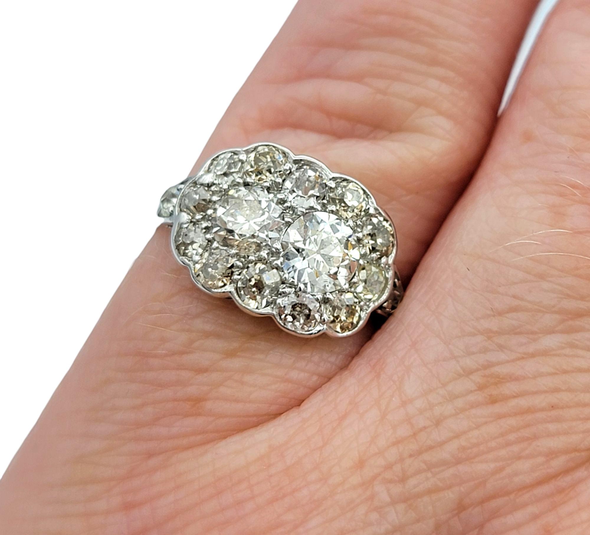 Vintage Old European and Old Mine Cut Diamond Cluster Ring in Polished Platinum For Sale 3