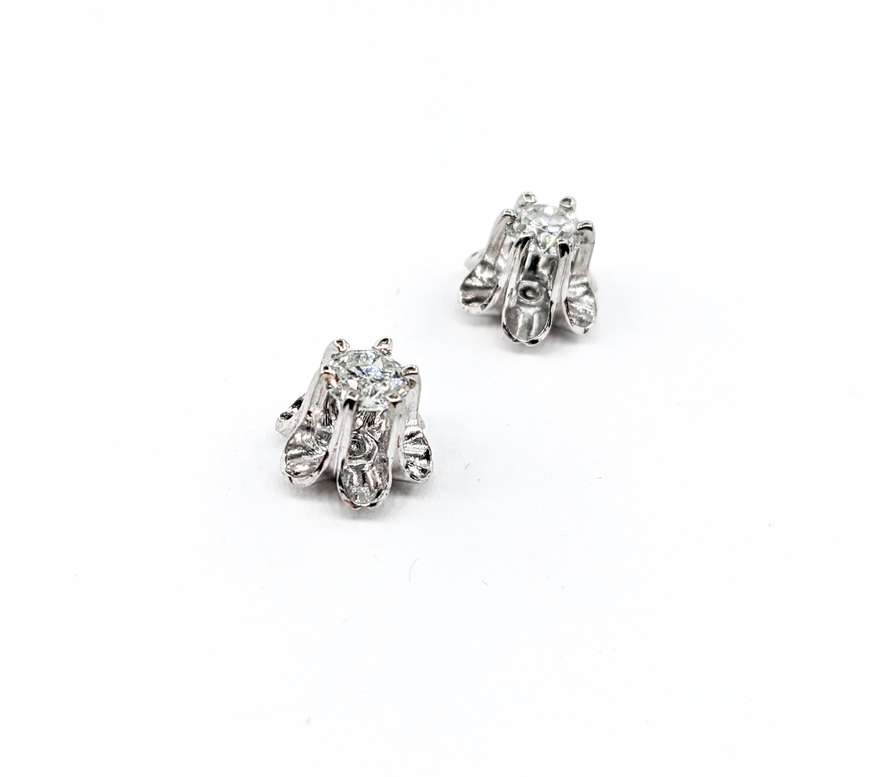 Vintage Old European Buttercup Stud Diamond Earrings In White Gold 

Introducing the timeless elegance of these Buttercup Stud Earrings, beautifully crafted in 14kt white gold. They boast .45ctw of Old European cut diamonds that sparkle with I