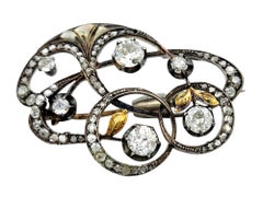 Antique Old European, Old Mine and Rose Cut Diamond Mixed Metal Swirl Brooch
