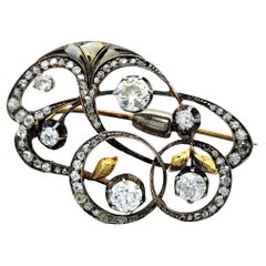 Antique Old European, Old Mine and Rose Cut Diamond Mixed Metal Swirl Brooch