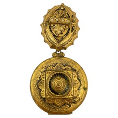 Altes goldenes Perlen-Medaillon mit baumelnder Brosche
