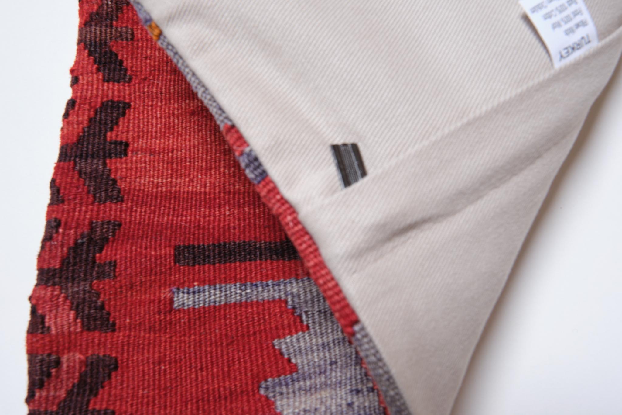 We made a cushion cover using the undamaged part of the precious and high-quality old & antique kilims that cannot be repaired as a whole. Like a painting, a part of the scenery is cut out from a kilim, and even several covers cut out from the same