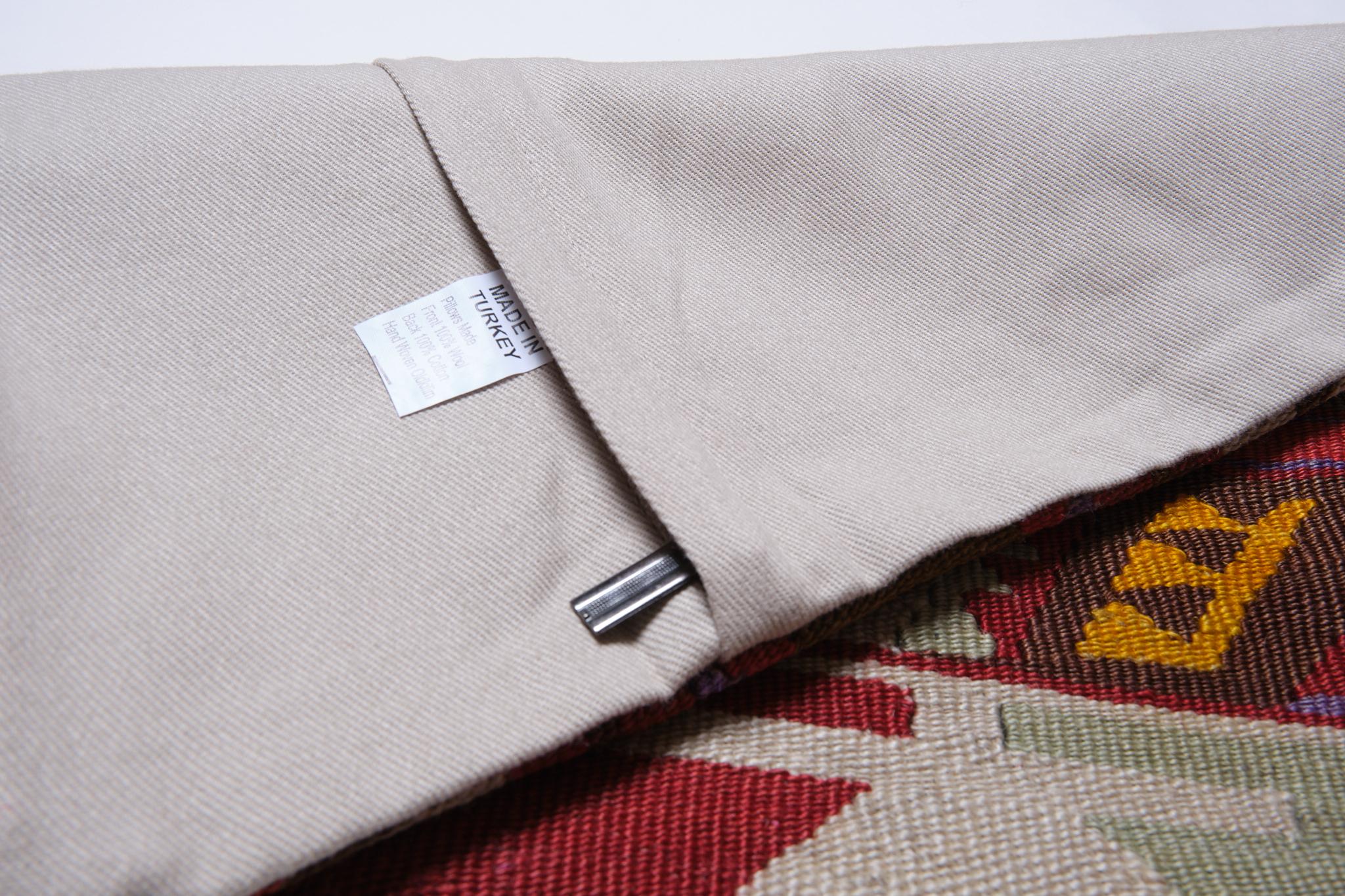We made a cushion cover using the undamaged part of the precious and high-quality old & antique kilims that cannot be repaired as a whole. Like a painting, a part of the scenery is cut out from a kilim, and even several covers cut out from the same
