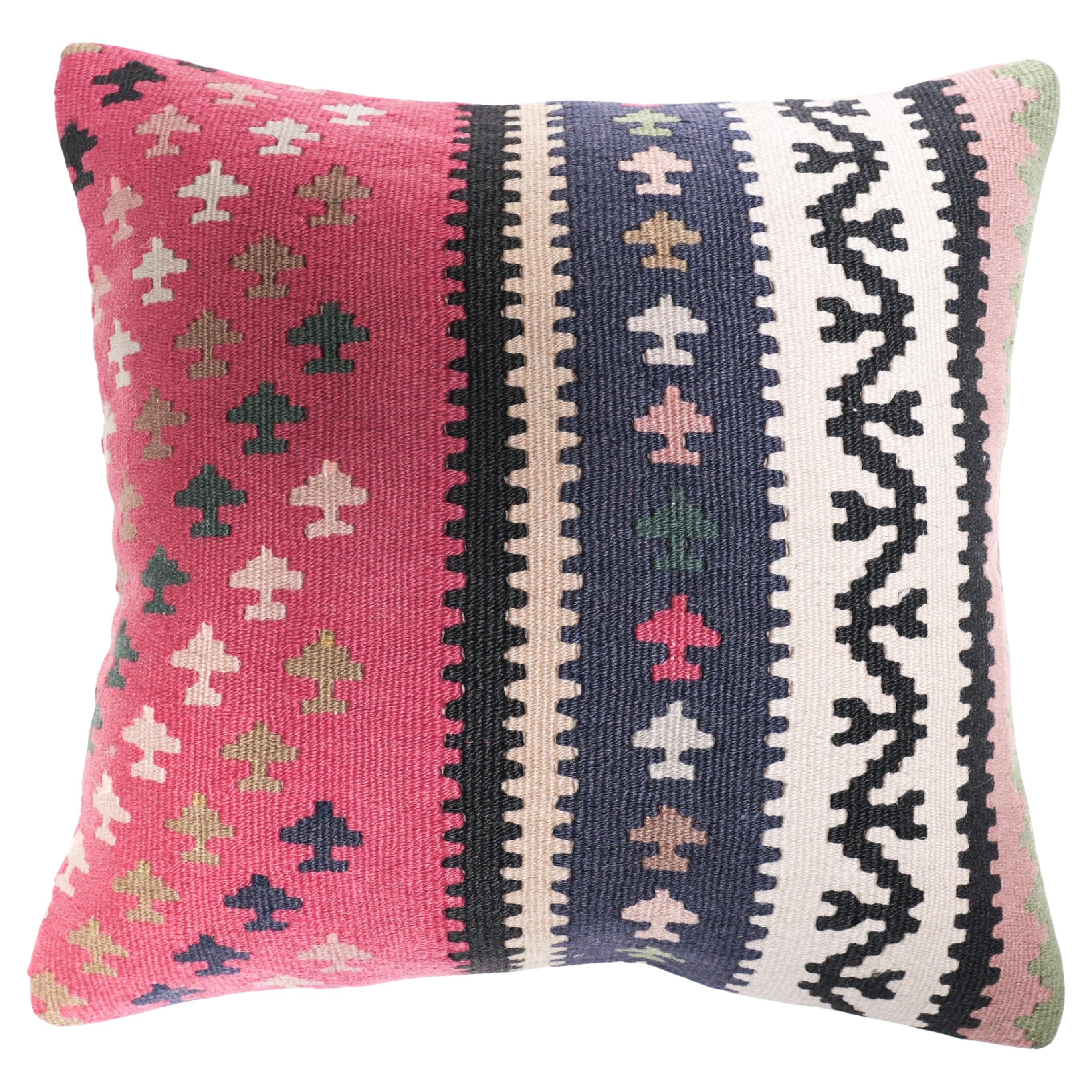 What is the difference between a rug and a kilim?
