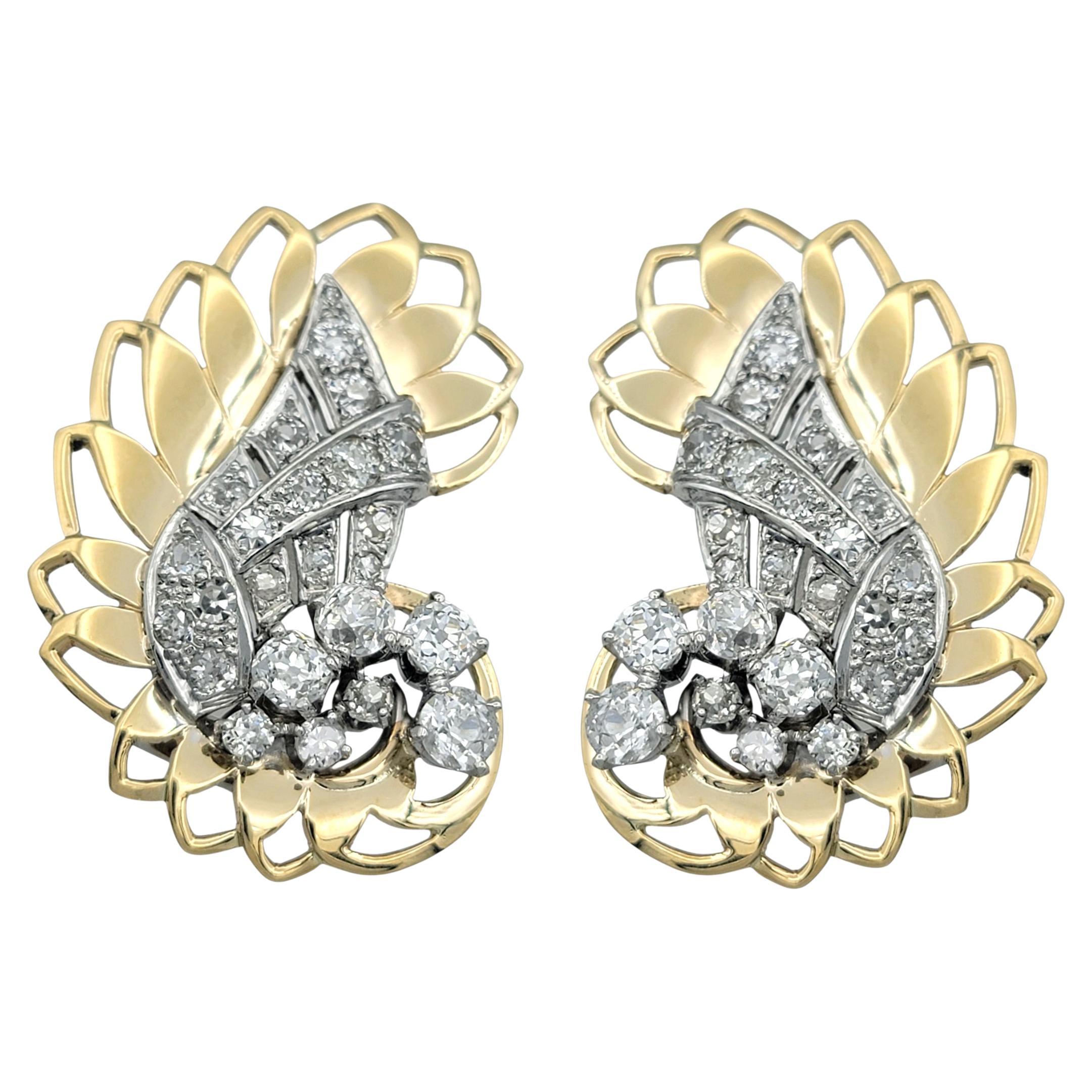Orecchini a clip con diamanti d
epoca e diamanti a taglio singolo in oro 18 carati e platino