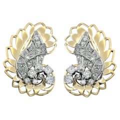 Orecchini a clip con diamanti d
epoca e diamanti a taglio singolo in oro 18 carati e platino