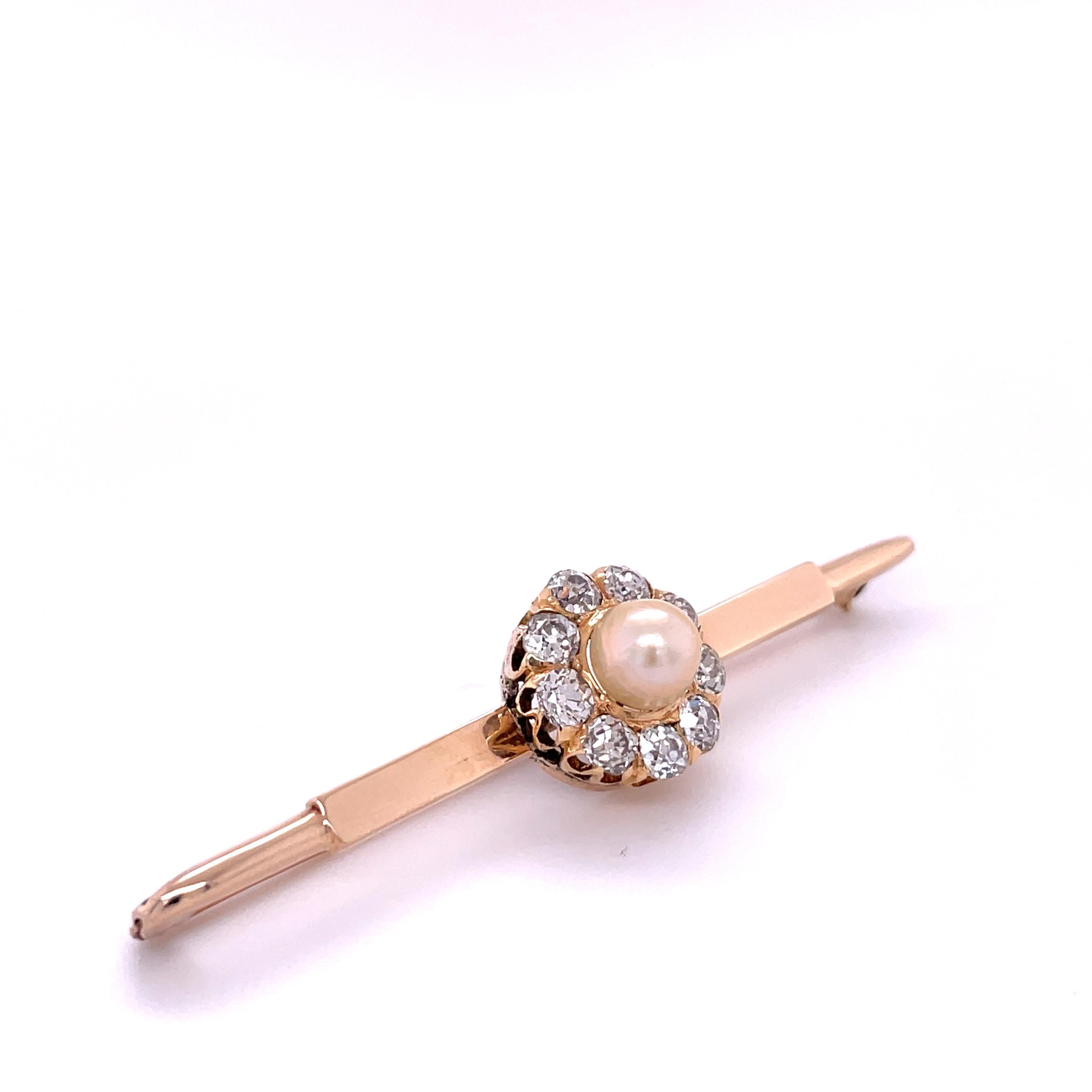 Item Details: 
Metal Type: 14k Yellow Gold  [Tested]
Weight:  5.6 grams

Diamond Details:
Weight: 1.25ct, total weight
Cut: Old European brilliant
Color: G-H
Clarity: VS/SI

Pearl: Natural, .75ct

Measurement: 2.25 inches long total
Condition: 