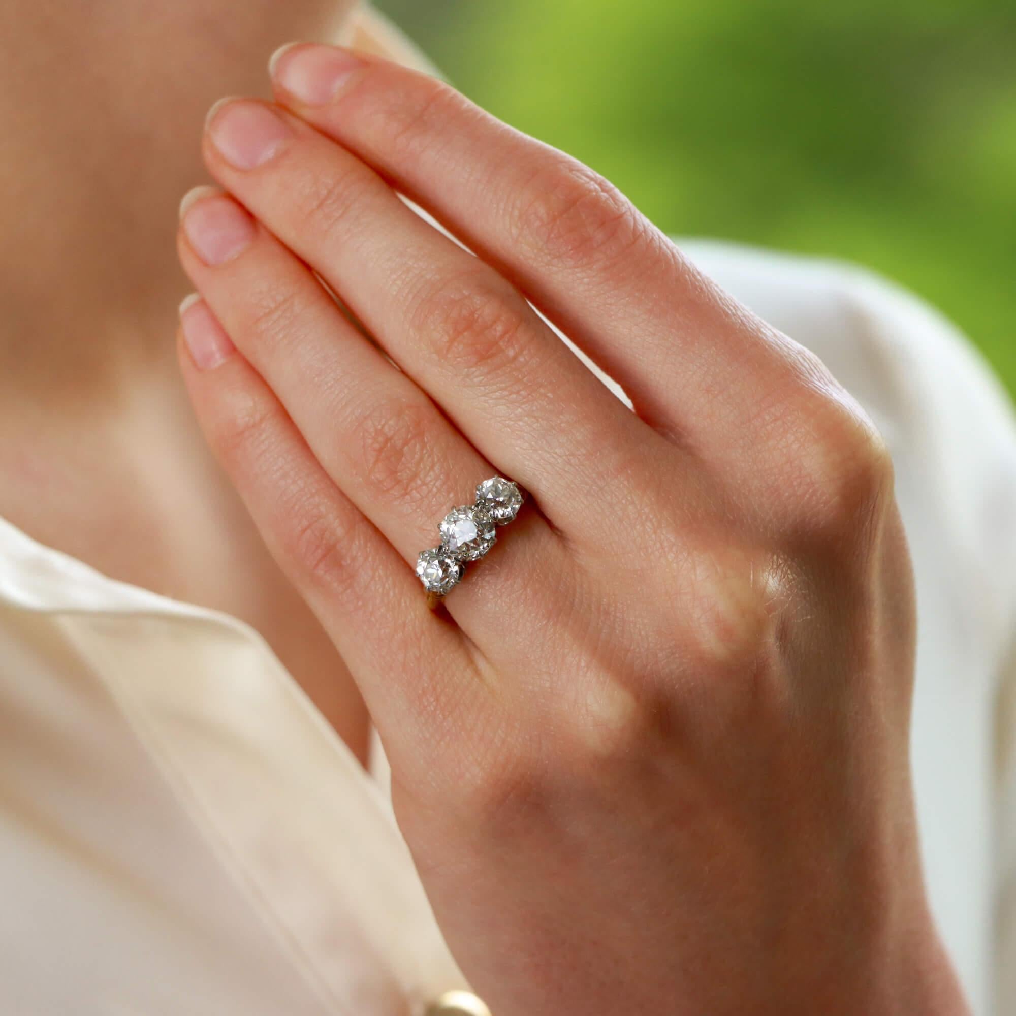 old mine cut three stone ring