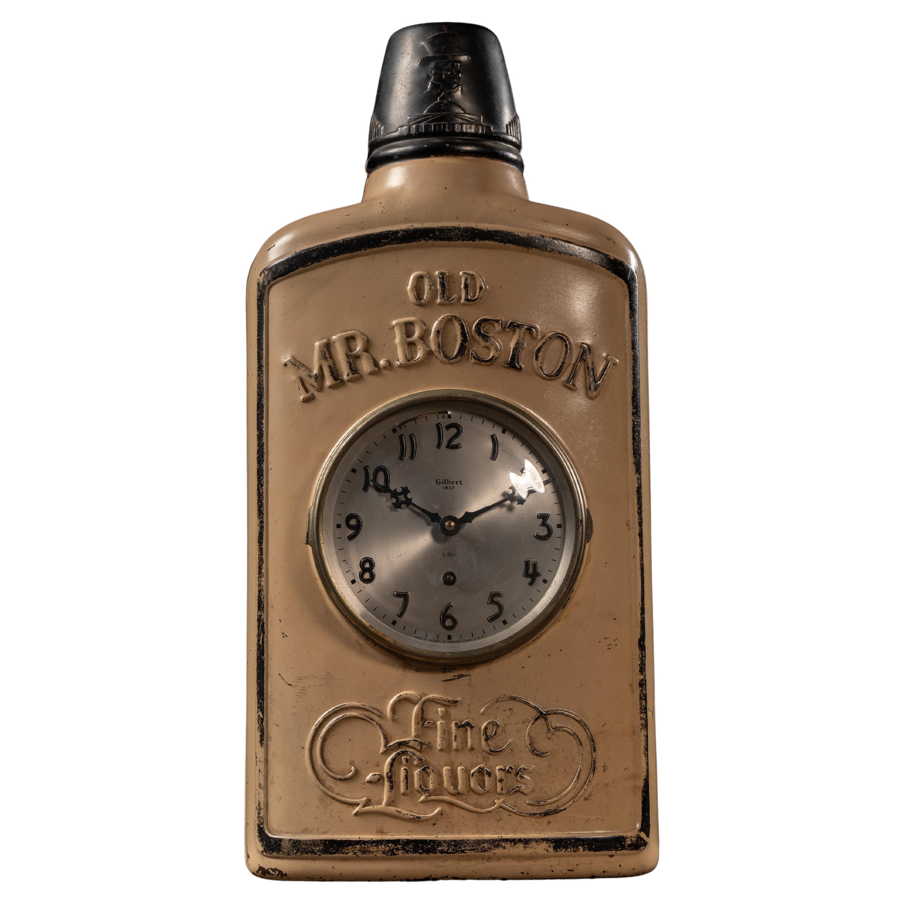 Espositore per bottiglie pubblicitarie d
epoca Mr. Boston con orologio a 8 giorni Gilbert in vendita