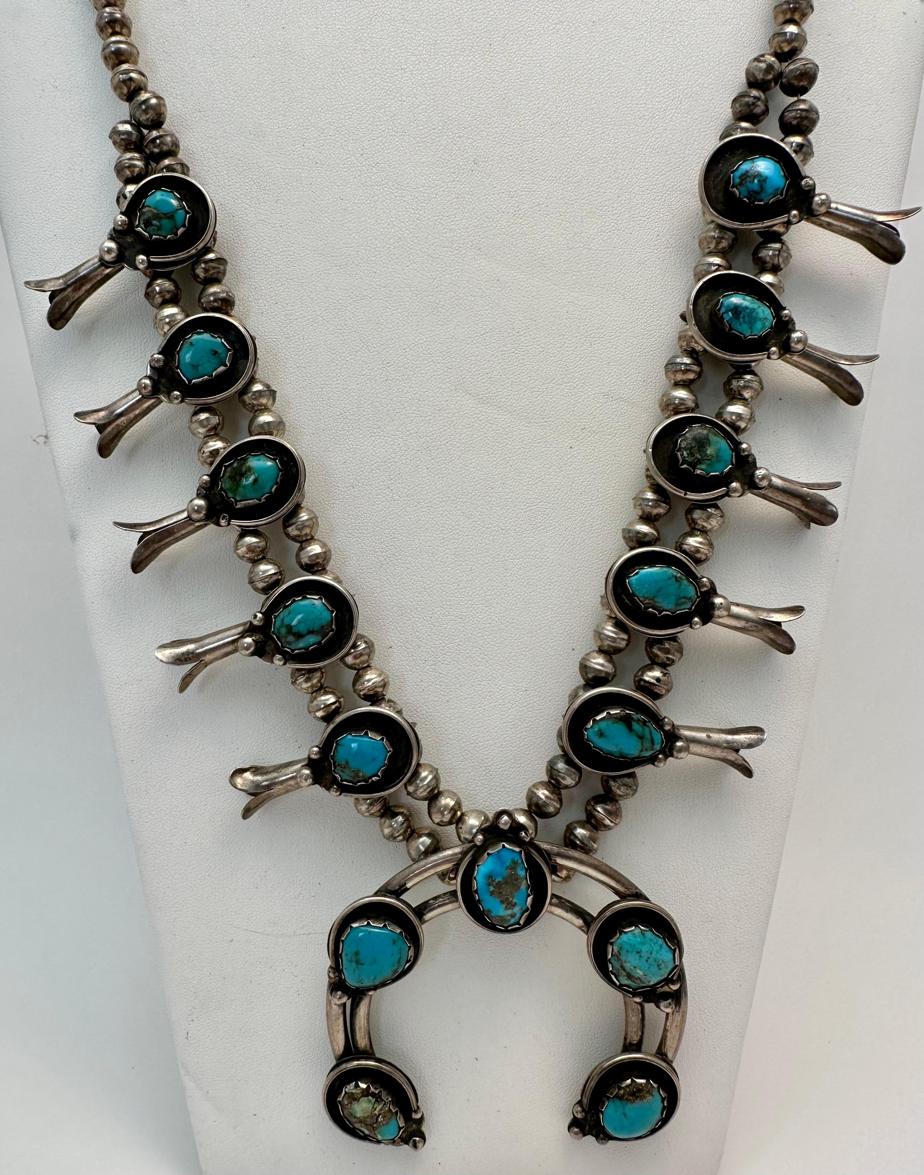 Vintage Navajo Sterling Silver .925 Turquoise Squash blossom. 
Measures approximately 30