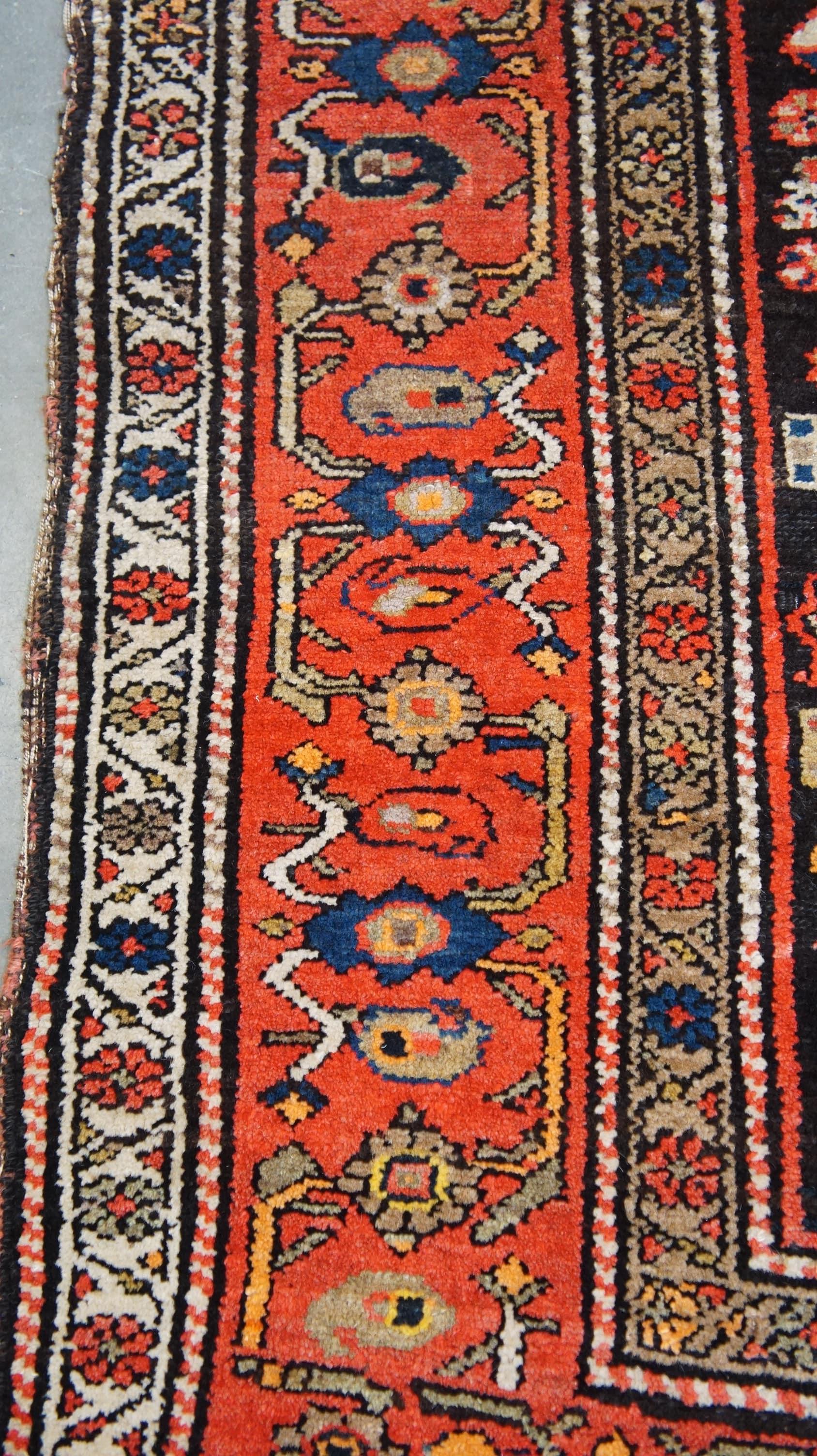 Hand-Crafted Vintage rug hand-knotted and in oriental style with beautiful colors 228x114 cm For Sale