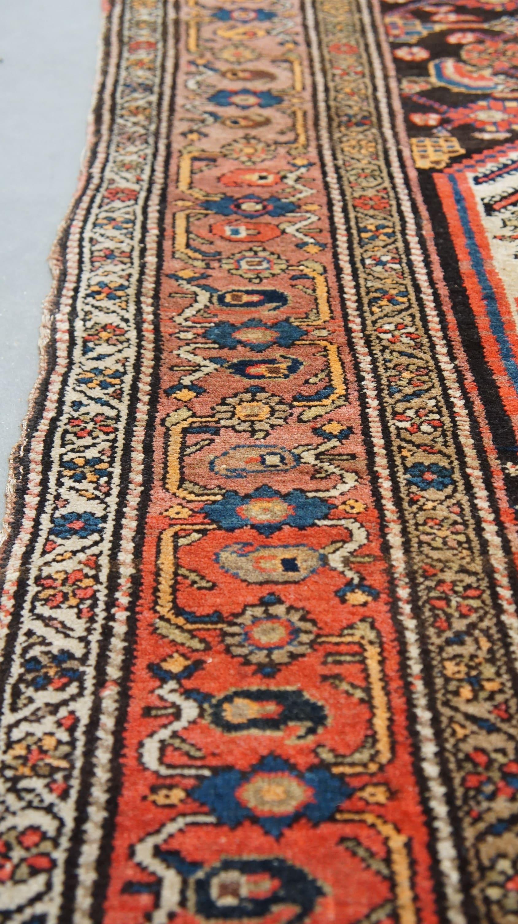 Vintage rug hand-knotted and in oriental style with beautiful colors 228x114 cm In Fair Condition For Sale In Harderwijk, NL