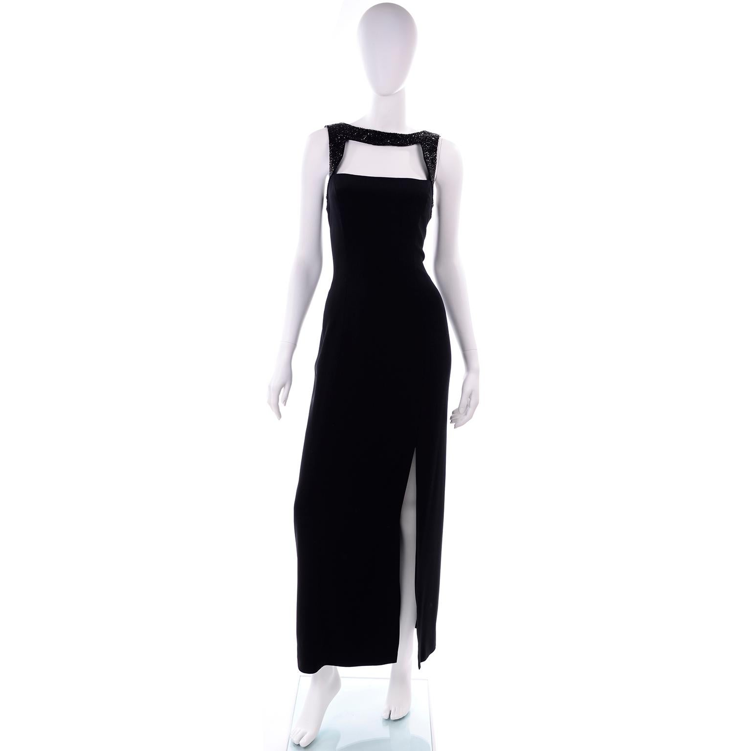 This is a show stopping vintage black Oleg Cassini Black Tie evening gown with a 24