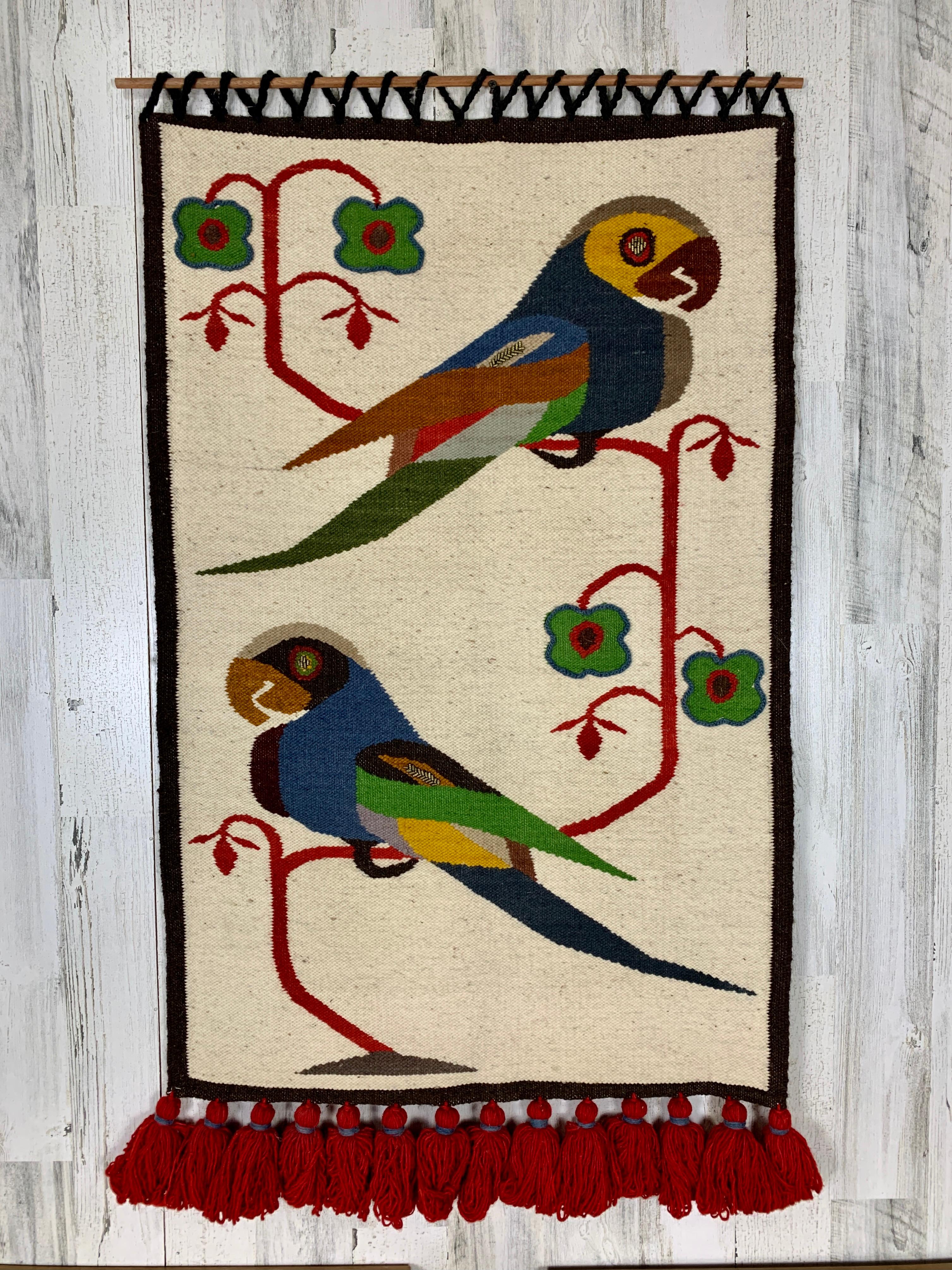 Vintage Olga Fisch folklore wall tapestry. Woven wool with metal bead accents. 
Tassels are 3in. thick.