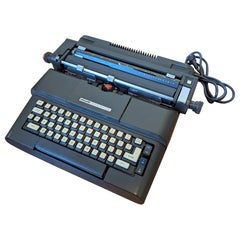 Máquina de escribir eléctrica Olivetti Lexikon de época