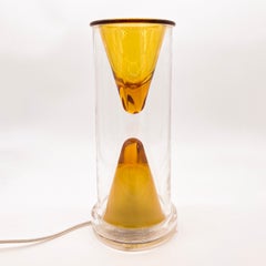 Lampe de bureau vintage Oluce Nerolia en verre transparent et orange, design italien