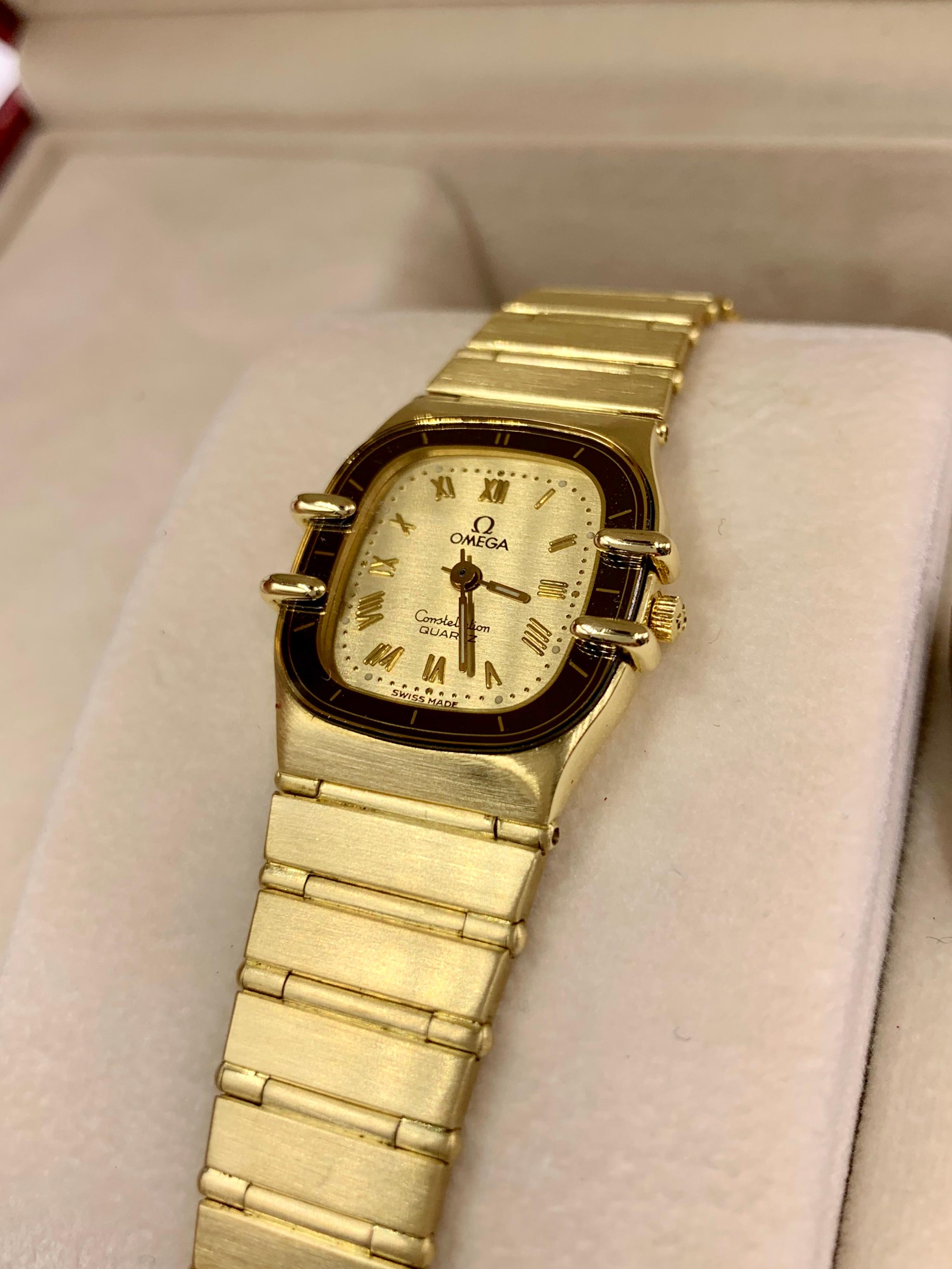 omega constellation gold bracelet