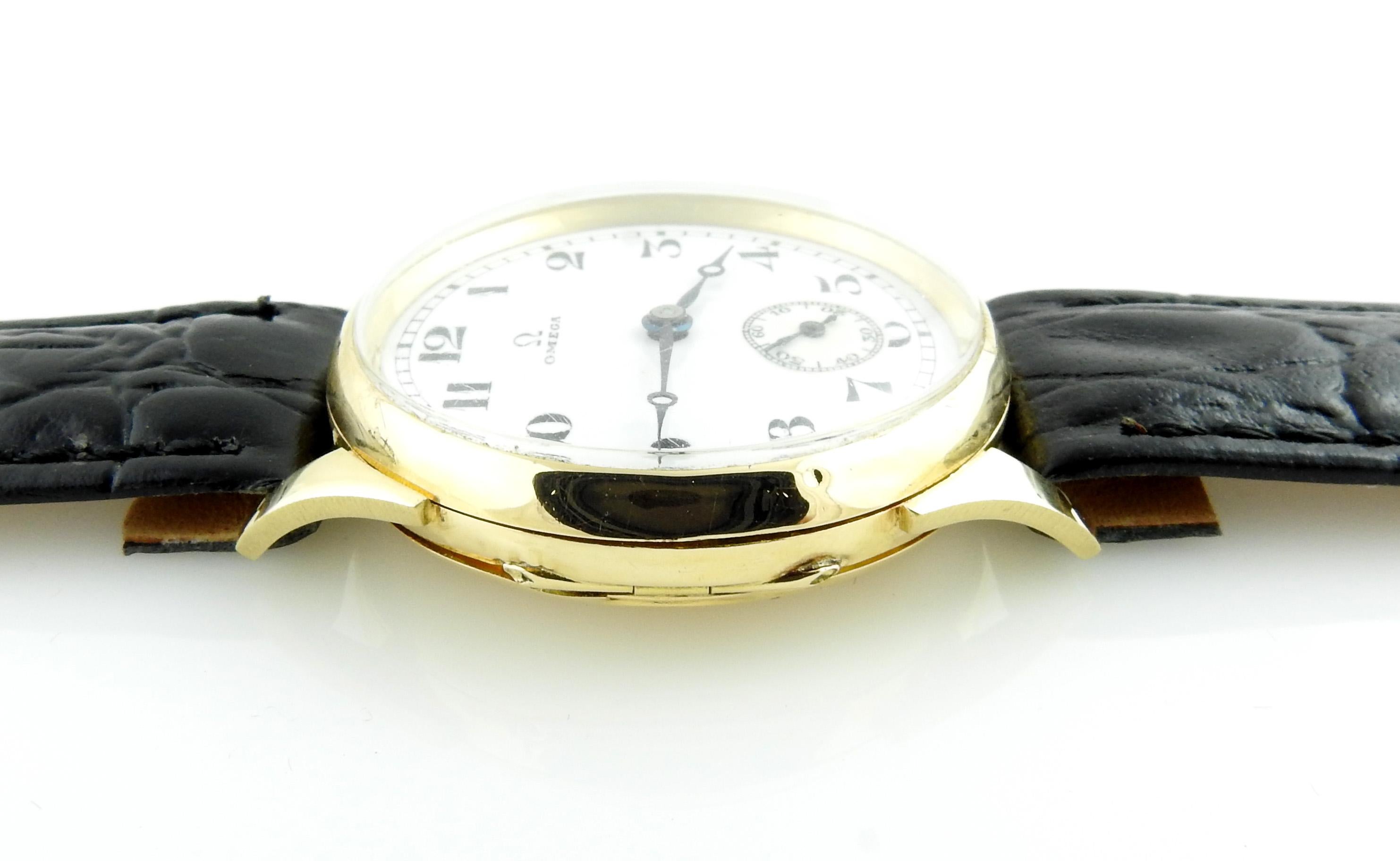 Vintage Omega 18K Gold Men's Watch

Model 7663654
Serial: 7763596

This vintage omega watch is set in an 18K Gold case - approx. 35mm

White dial with black Arabic markers and blue hands

Automatic movement - hand winding

New black leather band -