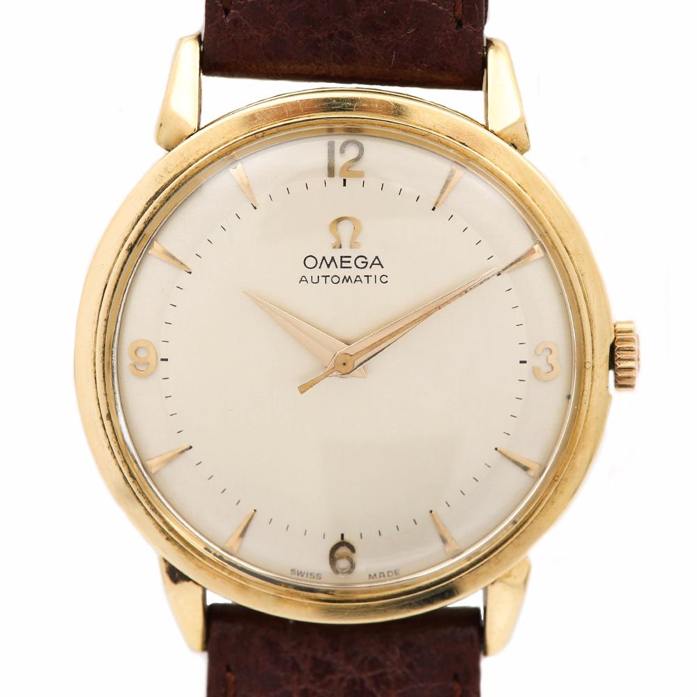 A wonderful example of a classic, mid-1950s, gents vintage Omega Automatic dress watch with a large sized 35mm 18 karat yellow gold case. Features include the stunning two-tone dial and the amazing condition of the high grade, bumper automatic