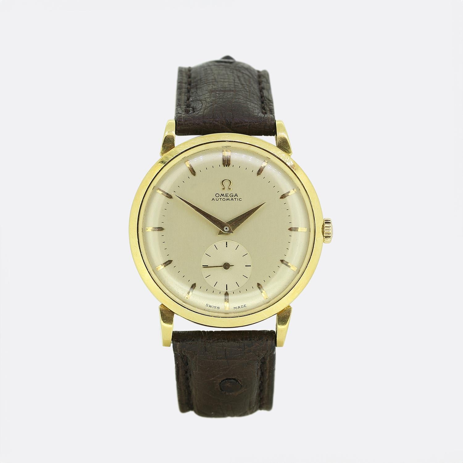 This is an 18ct yellow gold vintage gentlemen's automatic Omega. The round dial is signed Omega Automatic and below 