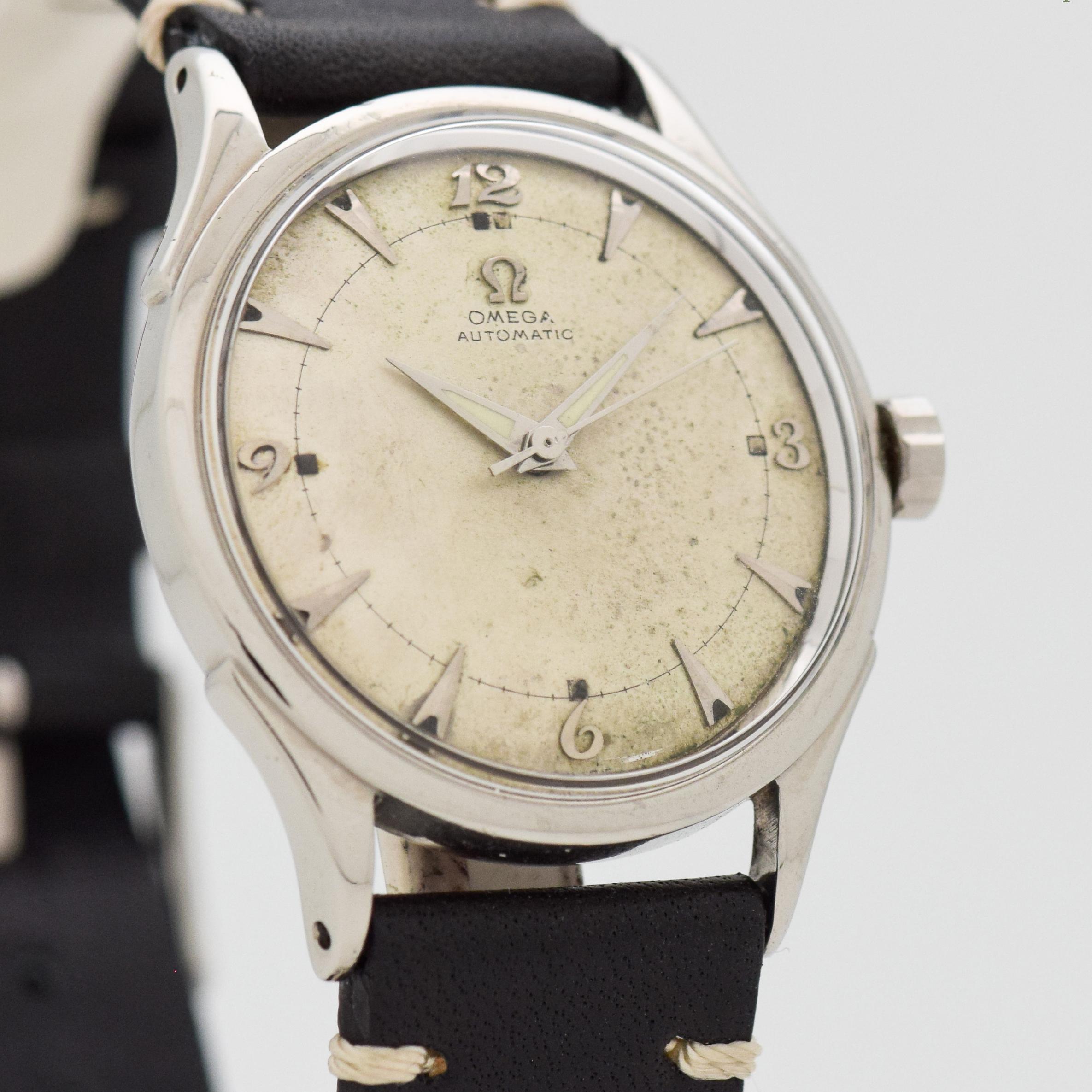 1951 Vintage Omega Ref. 2635-1 Stainless Steel watch with Original Silver Dial with Applied Steel Breguet Arabic 3, 6, 9, and 12 and Elongated Arrow Markers. 32mm x 40mm lug to lug (1.26 in. x 1.57 in.) - 17 jewel, automatic caliber movement.