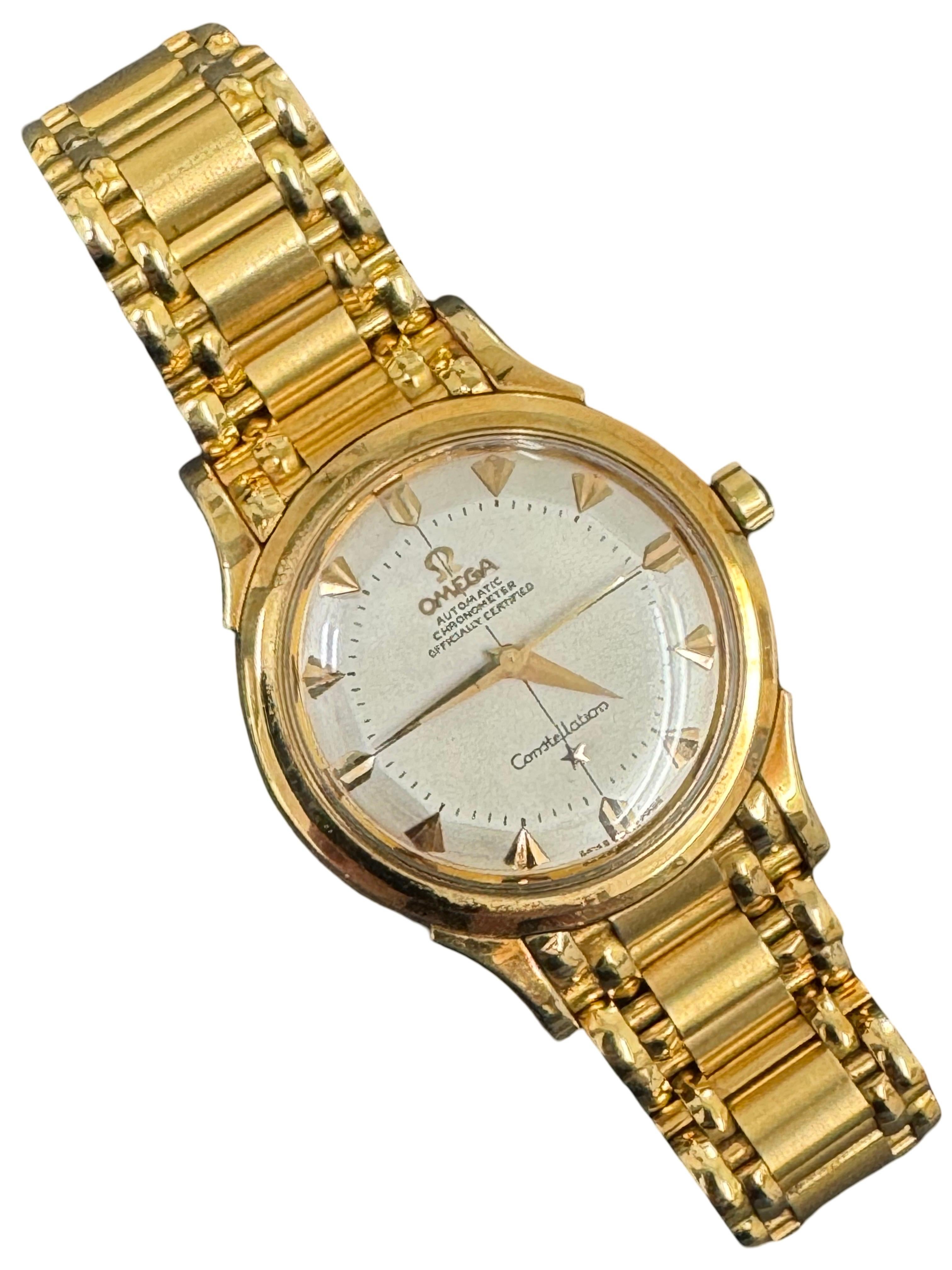 A superb and highly coveted Omega Constellation Pie-Pan executed entirely in solid 18-karat gold, featuring its original brick-link Omega bracelet — an elite and investment-grade example of Omega’s most iconic mid-century chronometer line.

This