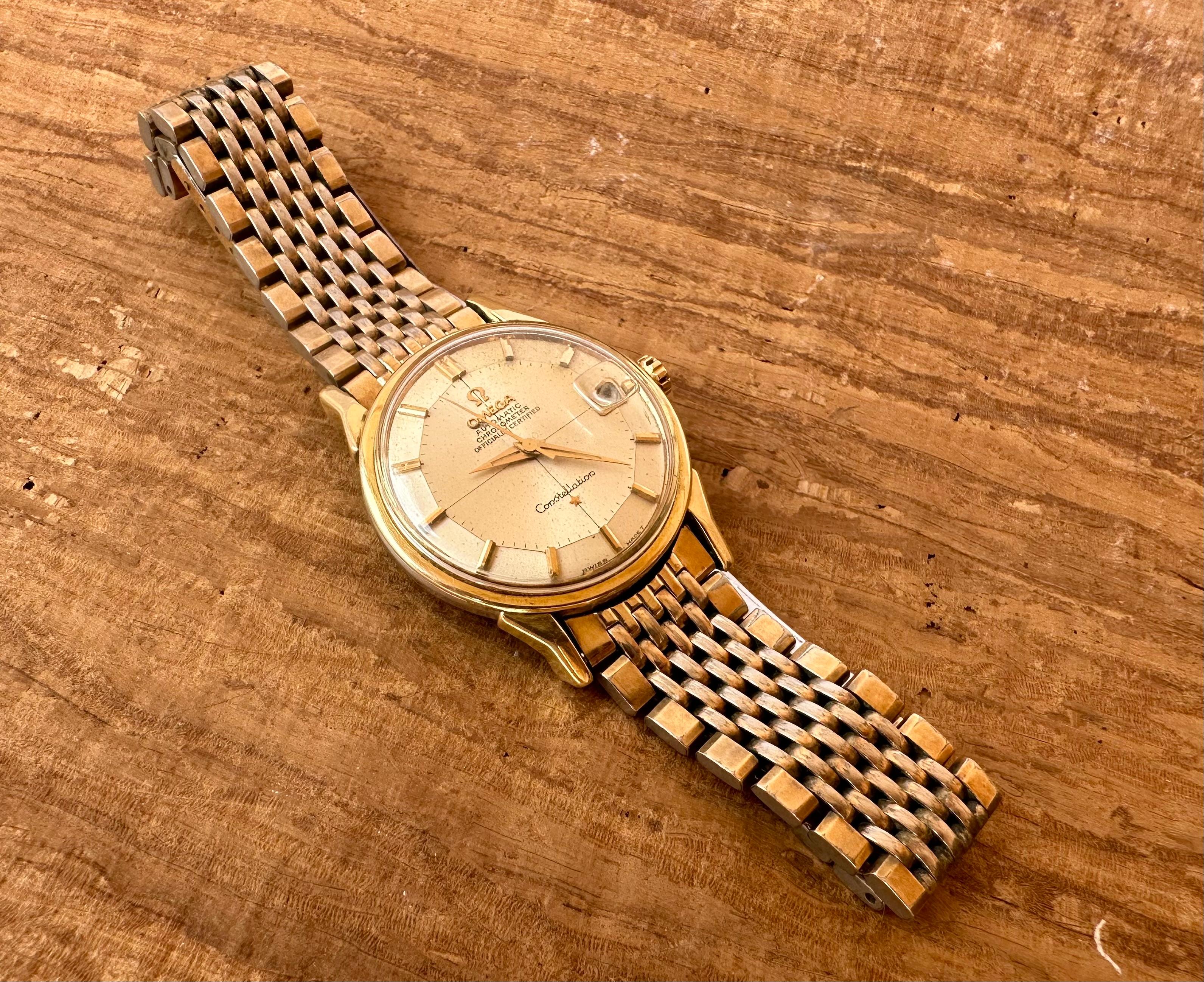 Brand: Omega

Model: Constellation 

Reference Number:168.005

Country Of Manufacture: Switzerland

Movement: Automatic

Case Material: Gold Plated & Stainless steel

Measurements : Case width: 34 mm

Band Type : Gold Plated &Stainless steel

Band