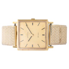 Reloj de pulsera vintage Omega De Ville en tono dorado
