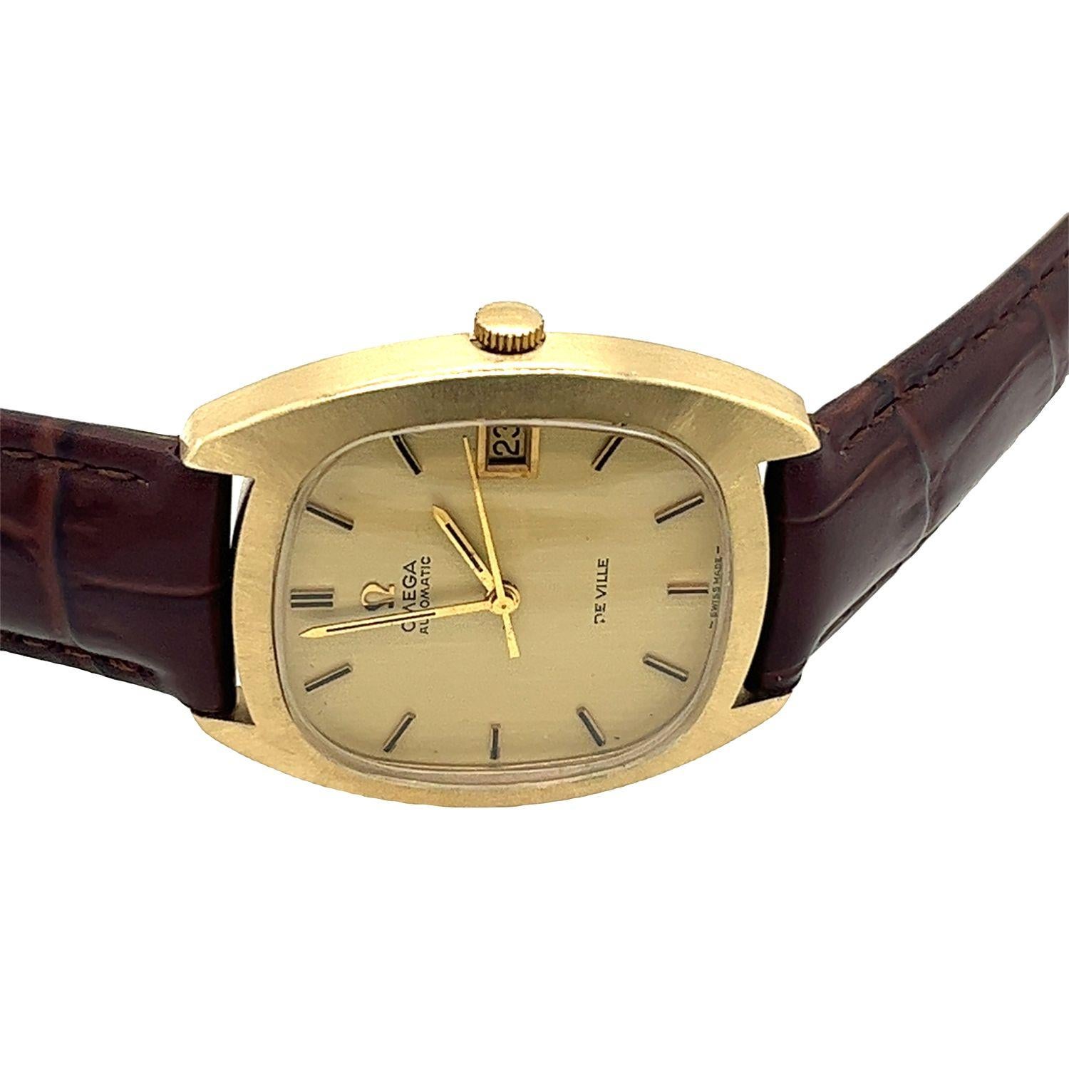 Introducing this vintage Omega Deville Automatic Mens Watch in 9ct Gold.  
A symbol of classic elegance and timeless style. 
The DeVille stands out with its cushion case and clean lines, embodying Omega's legacy of sophisticated design and