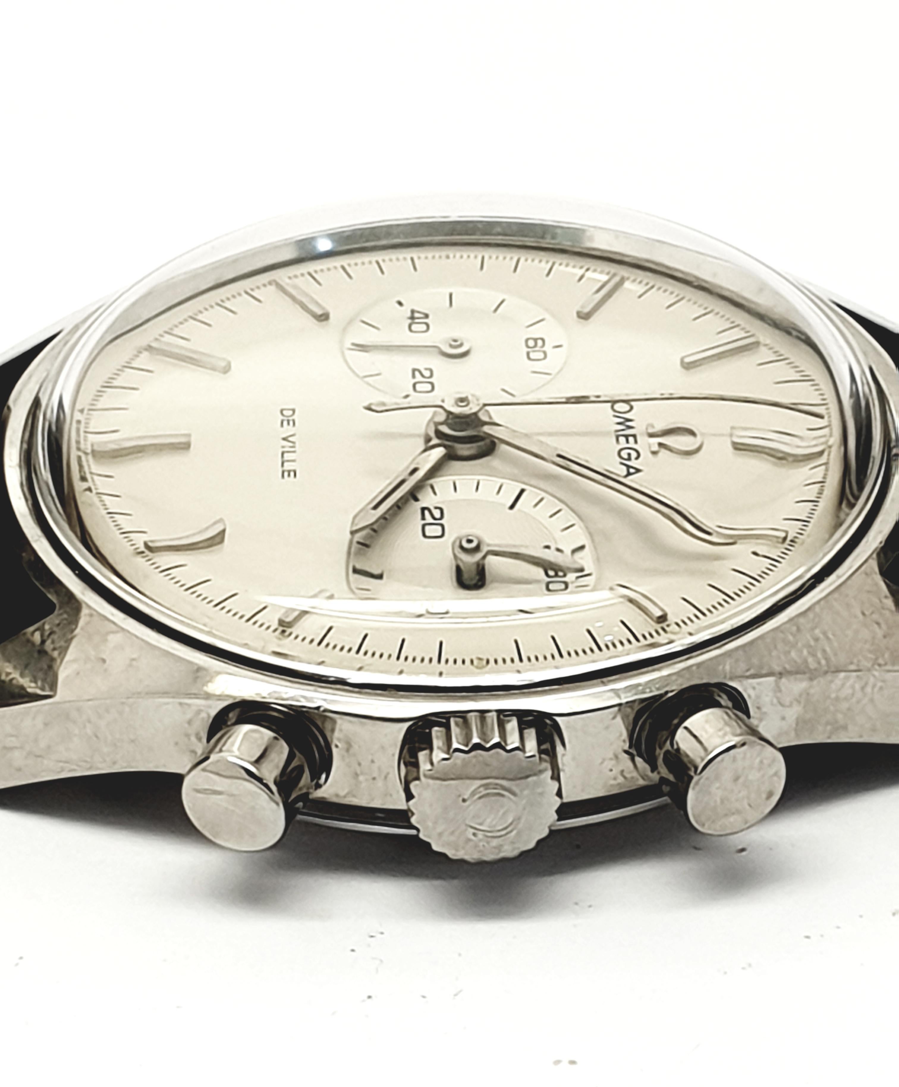  Offering for sale  a vintage Omega Deville Chronograph  stainless steel watch. Reference:145.017. The movement caliber is 860 Omega wind up.Thewatch has white silverish dial with silver hour markers  The piece is in good working order  it comes