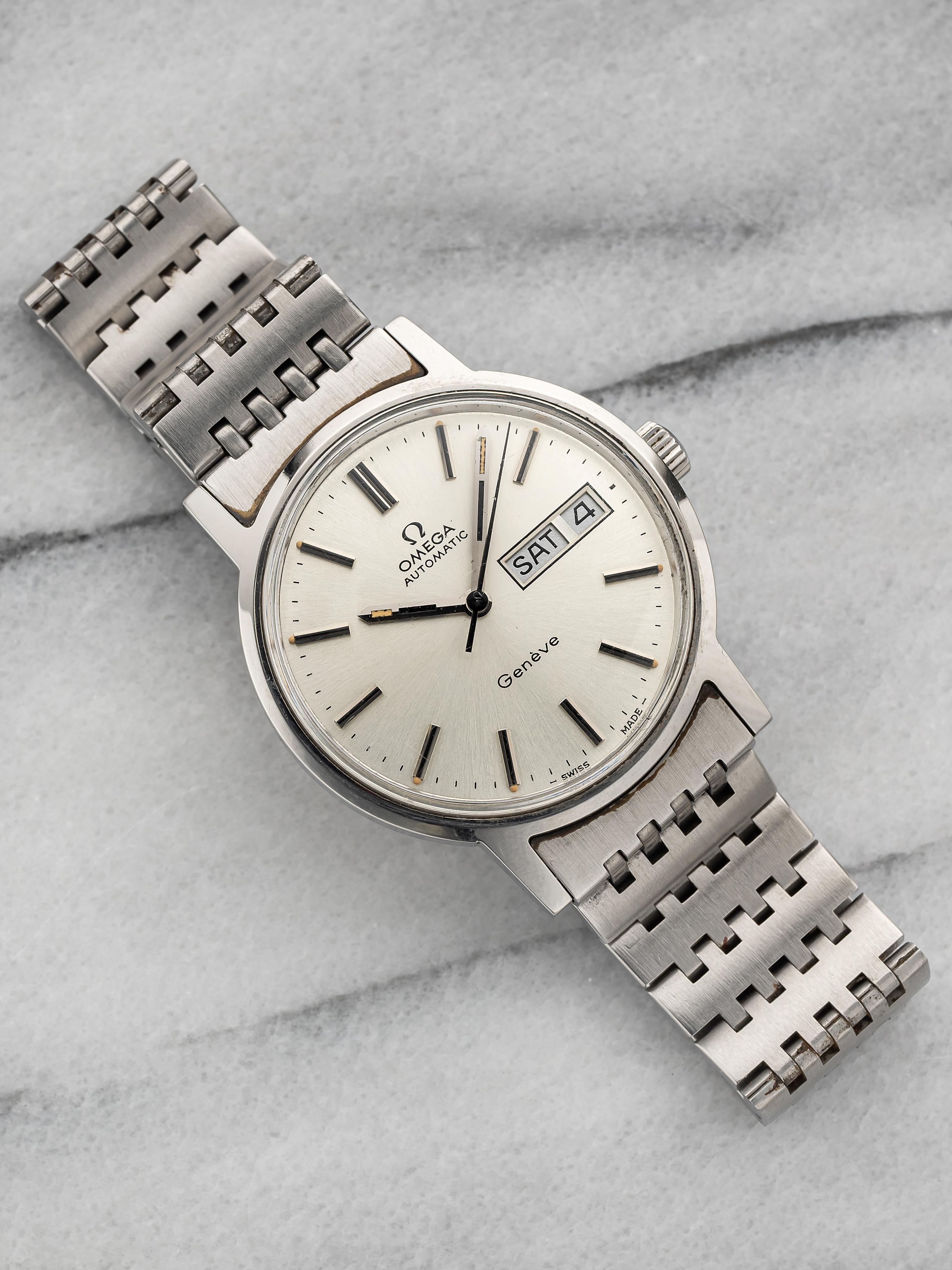 Here's a vintage Omega Geneve automatic with silver dial and day/date function from the 1970s. Keeps great time and is fully functional. Measurements include a 37mm case with an integrated bracelet that fits up to a 7.25 inch wrist. Time and