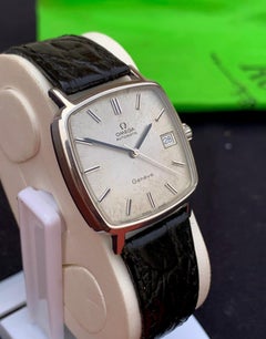 Vintage Omega Geneve Automatic Watch: English Made Dennison Stainless Steel