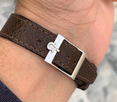 Vintage Omega Geneve, Automatic Winding English made Dennison Stainless case