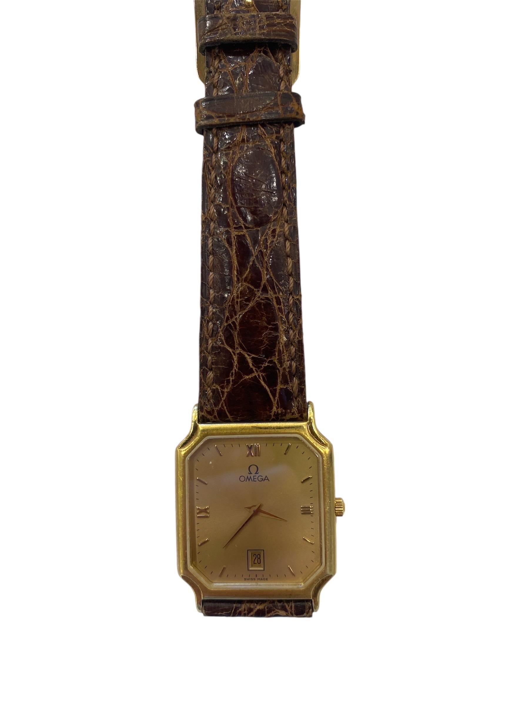 Vintage Omega Gold-Plated Rectangular Watch with Brown Leather Strap

For sale is a classic vintage Omega watch, featuring a unique rectangular gold-plated case and a luxurious brown leather strap with a distinctive textured pattern. The dial is