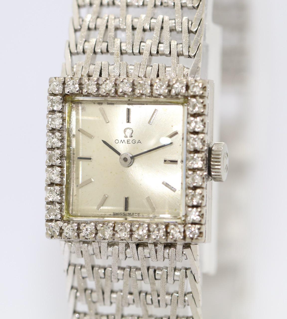 Vintage Omega Lady Armbanduhr in 18 Karat Weißgold. Mit Diamanten besetzt.

Mechanisches Uhrwerk mit Handaufzug. 

Mit Echtheitszertifikat.