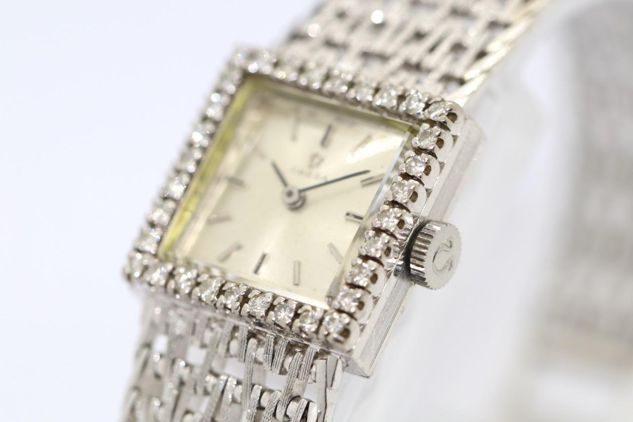 Women's Vintage Omega Lady Wrist Watch in 18 Karat White Gold, Set with Diamonds For Sale