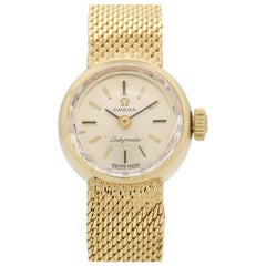 Omega Montre Ladymatic vintage en or jaune 14 carats, 1969