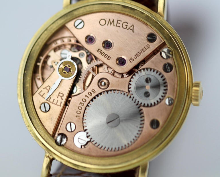Vintage Omega Men's Manual Winding Wristwatch in 18 Karat Yellow Gold, 1950s For Sale at 1stDibs