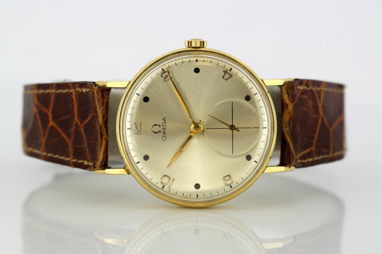 Vintage Omega Men's Manual Winding Wristwatch in 18 Karat Yellow Gold