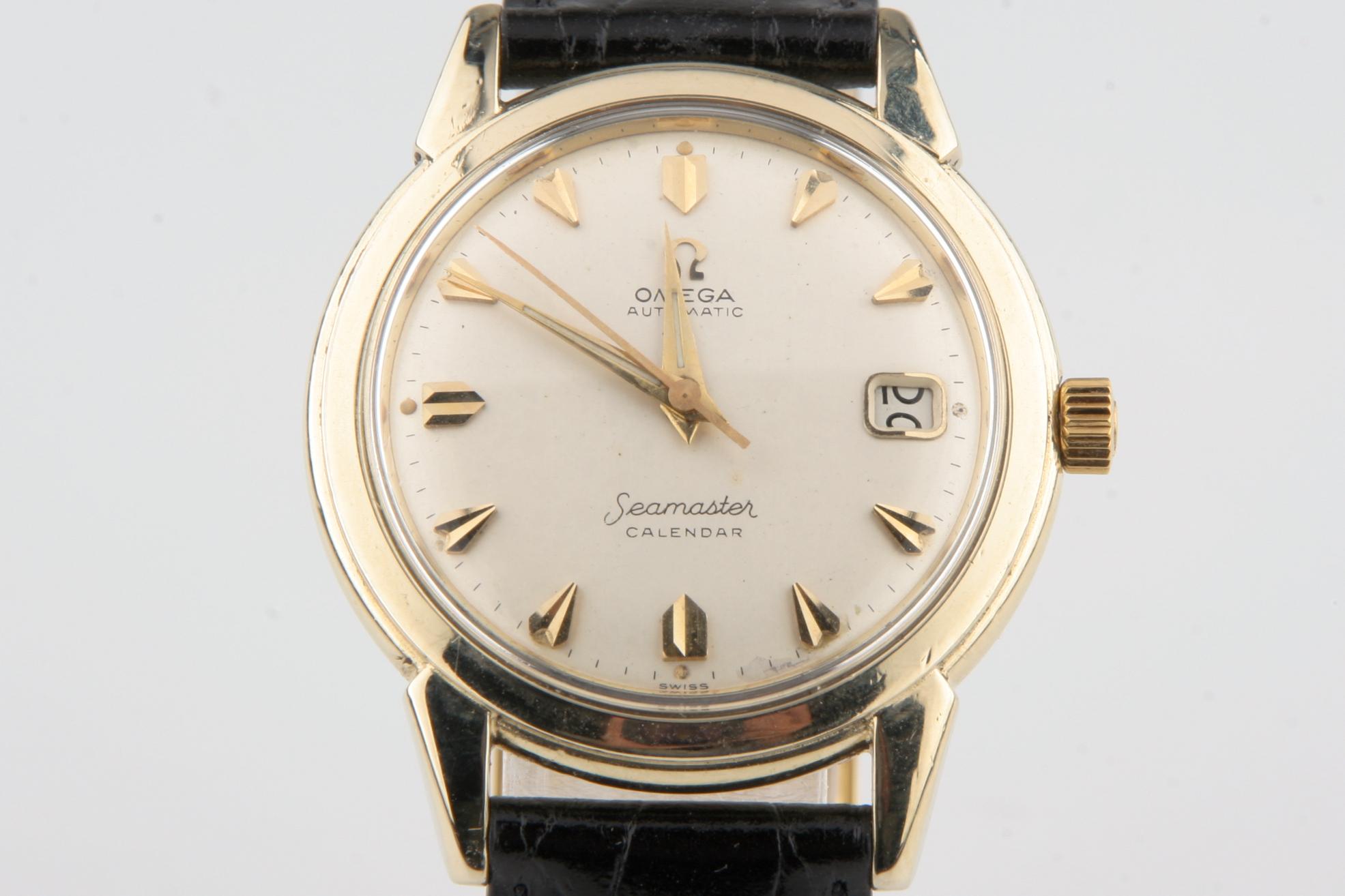 Vintage Omega Ω Men's Seamaster Calendar Automatic 14k Gold Filled Watch w/ Date

Movement #502.16043765
Case #KX6275.D70767

14k Gold Filled Case
35 mm in Diameter (37 mm w/ Crown)
Lug-to-Lug Distance = 42 mm
Thickness = 10 mm

Champagne Dial with