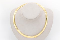 Collier Omega vintage en or jaune 14 carats